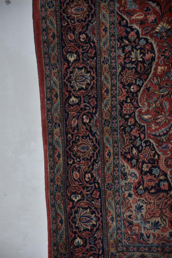 שטיח קאשאן בגווני אדום כחול כהה צהוב ותכלת