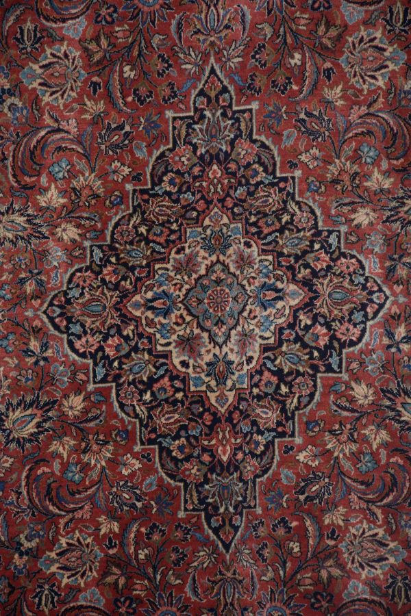 שטיח קאשאן בגווני אדום כחול כהה צהוב ותכלת