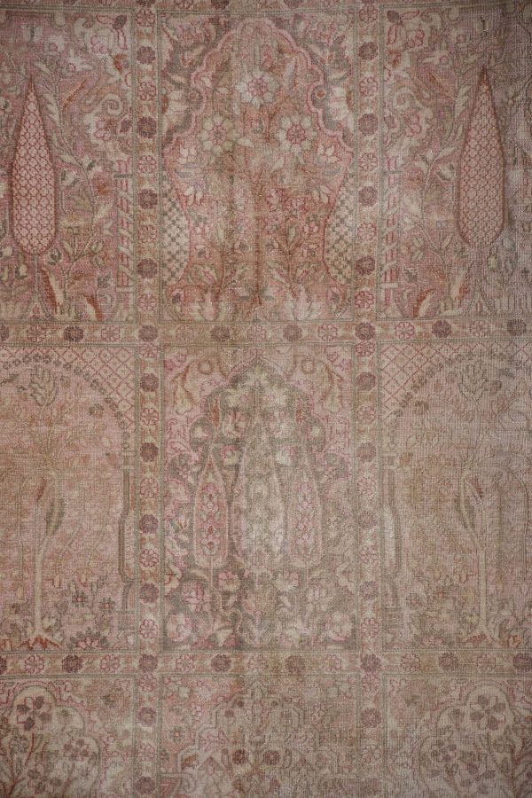 שטיח משי בגווני אדמדם וירוק