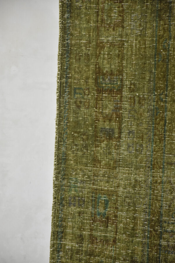 שטיח וינטאג' בגוונים ירוקים